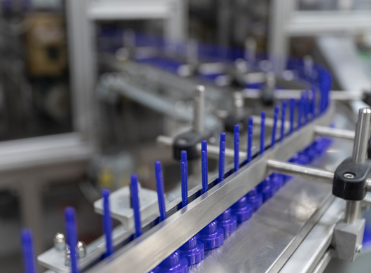 blue plastic parts in machine