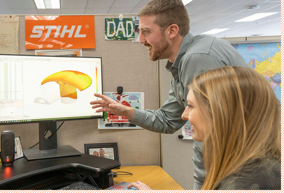 employees viewing model on computer